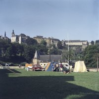« More than a postcard. Le Luxembourg entre arrivée et départ »