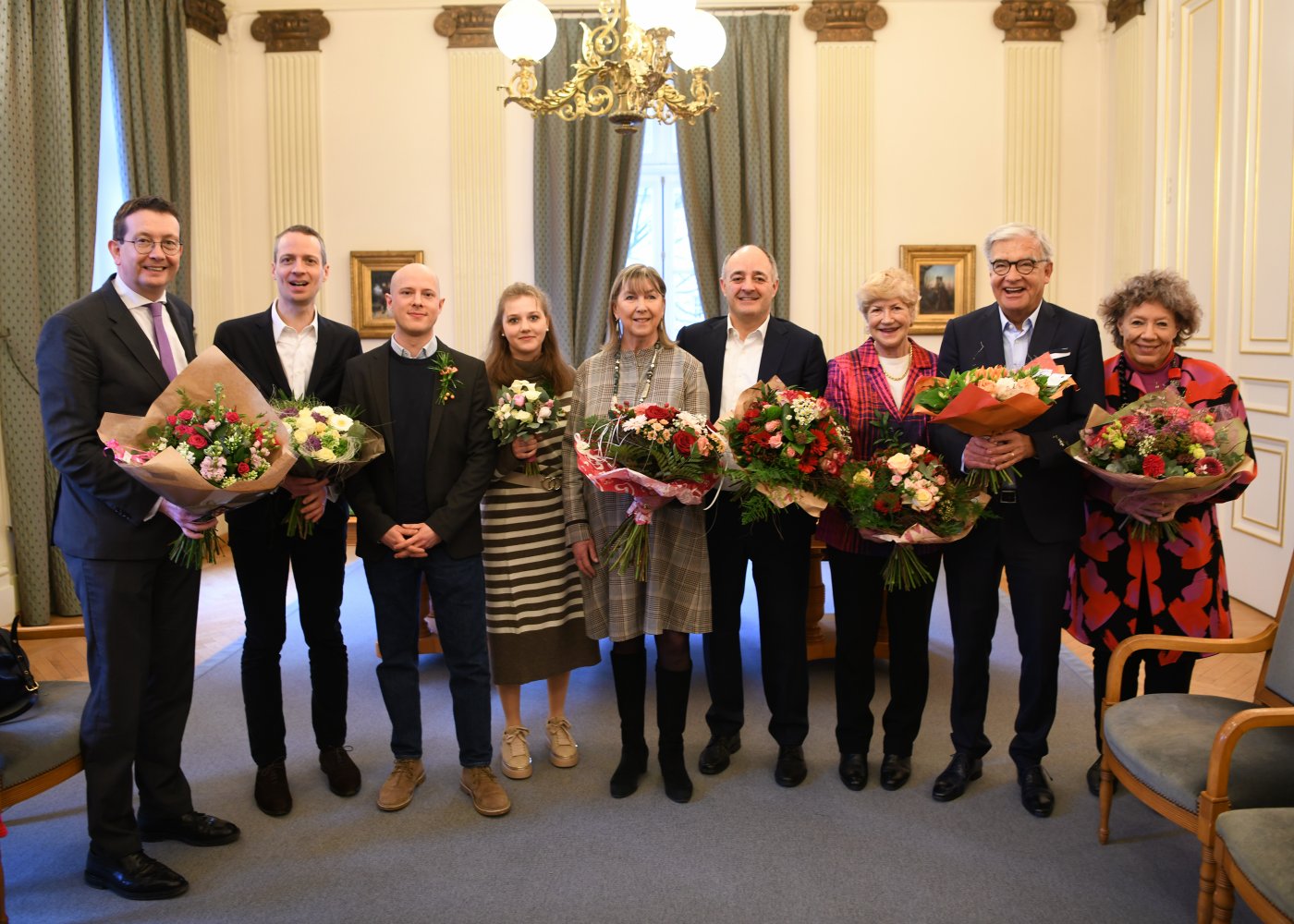 Remise de fleurs au Collège échevinal