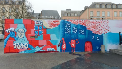 graffiti sur palissade de chantier sur la place Guillaume II